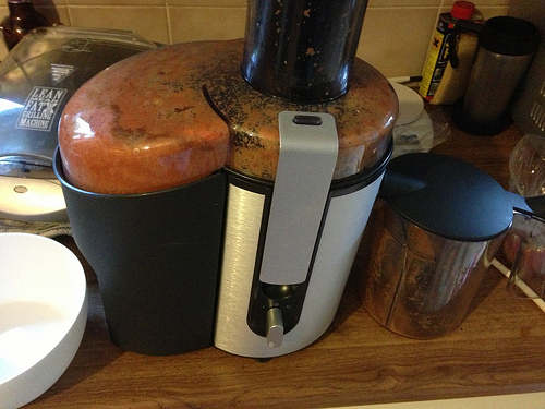 Juicer with debris from juicing