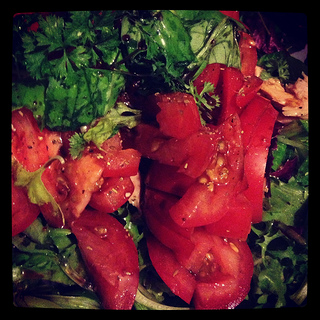 salad with tomatoes, lettuce and other fresh vegetables