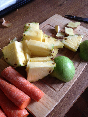 Carrot pineapple apple and fresh ginger root