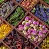 Herbal Teas Help Keep me Hydrated Assortment of dry herbs tea in wooden box.